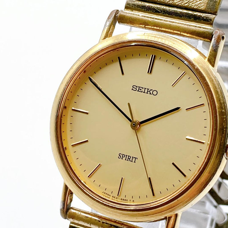 Seiko Spirit Mens Quartz Wristwatch Gold Tone Japanese Vintage Stretch Band 275