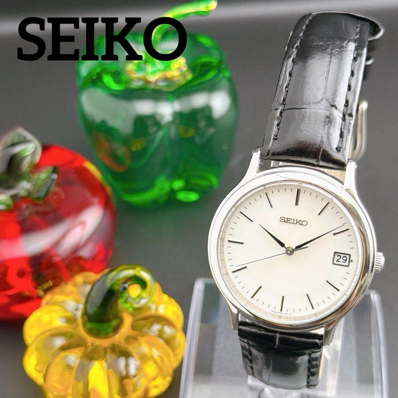 Seiko Spirit Quartz Mens Wristwatch White Dial Japanese Vintage Stainless Steel