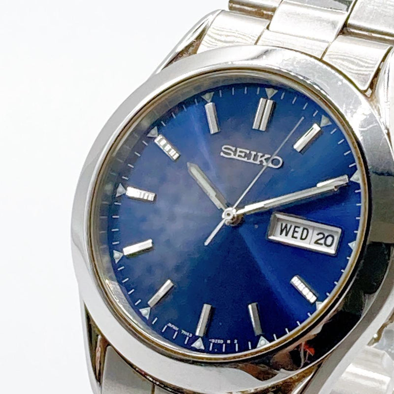 Seiko Mens Wristwatch Quartz Blue Dial Day Date 277 Japanese Vintage Stainless