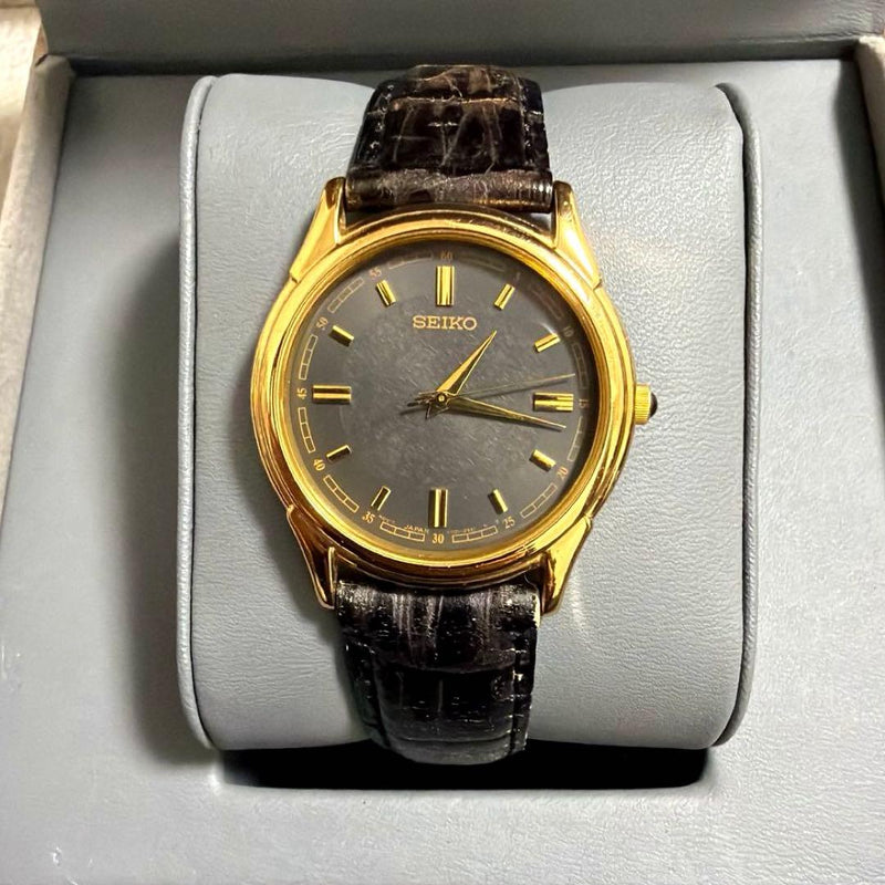Seiko Vintage Gold Black V701-1920 Japanese Quartz Analog Wristwatch Mens