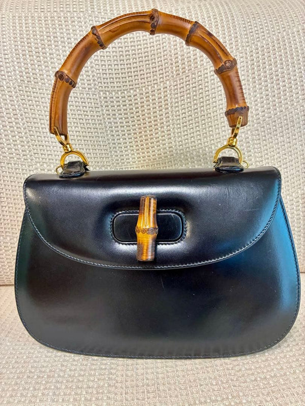 Gucci Old Gucci Bamboo Turn Lock Handbag Black Leather Red Interior