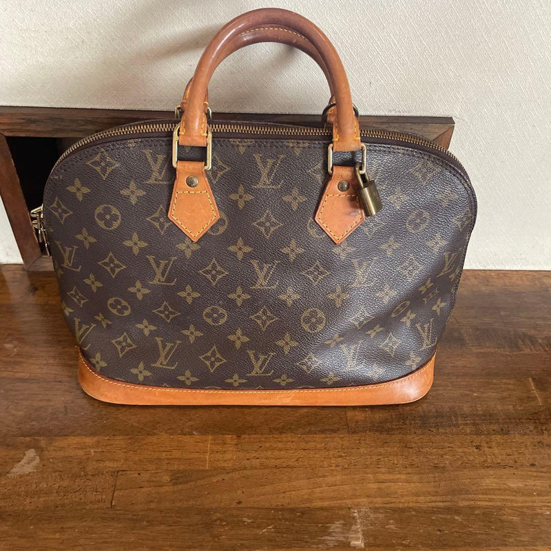 Louis Vuitton Alma Pm Monogram Handbag Brown