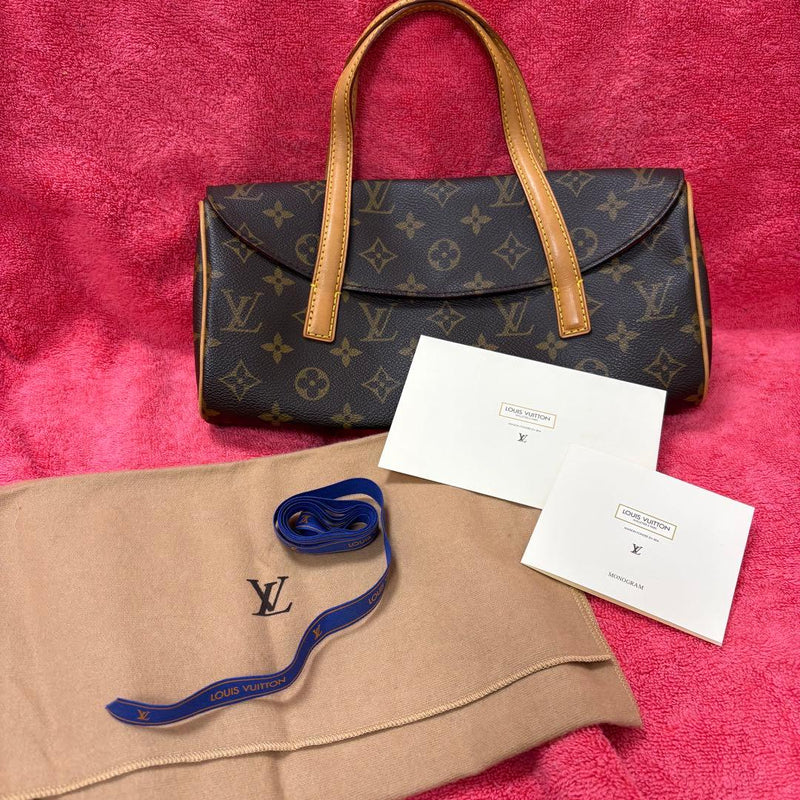 Louis Vuitton Sonatine Monogram Handbag Pouch
