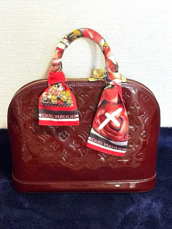 Louis Vuitton Embossed Handbag Red Leather With Key And Lock