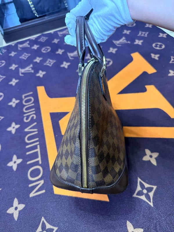 Louis Vuitton Alma Handbag Brown