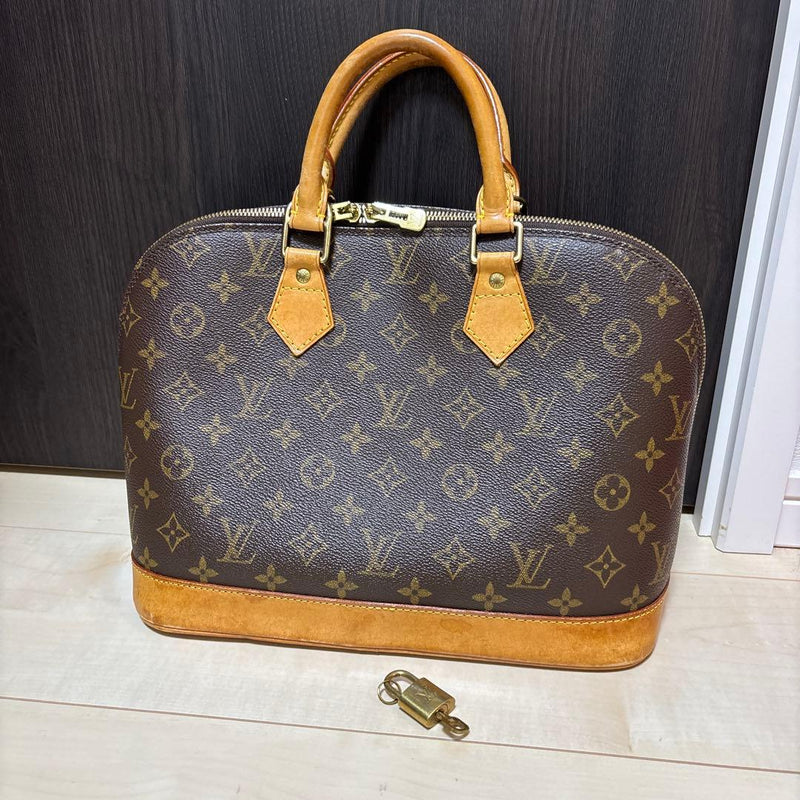 Louis Vuitton Alma Pm Monogram Handbag Brown Leather