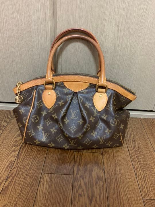 Louis Vuitton Tivoli Monogram Handbag Leather