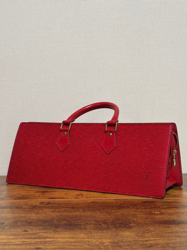 Louis Vuitton Sac Triangle Handbag Epi Leather Castilian Red