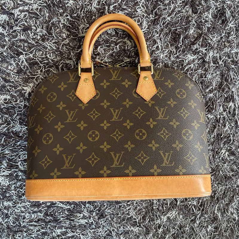 Louis Vuitton Alma Monogram Handbag Leather
