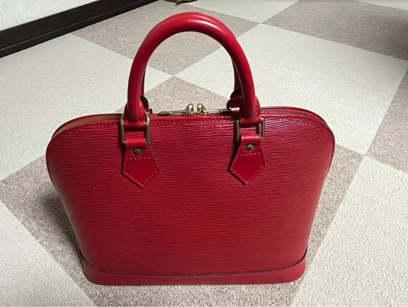 Louis Vuitton Epi Alma Handbag Red Leather