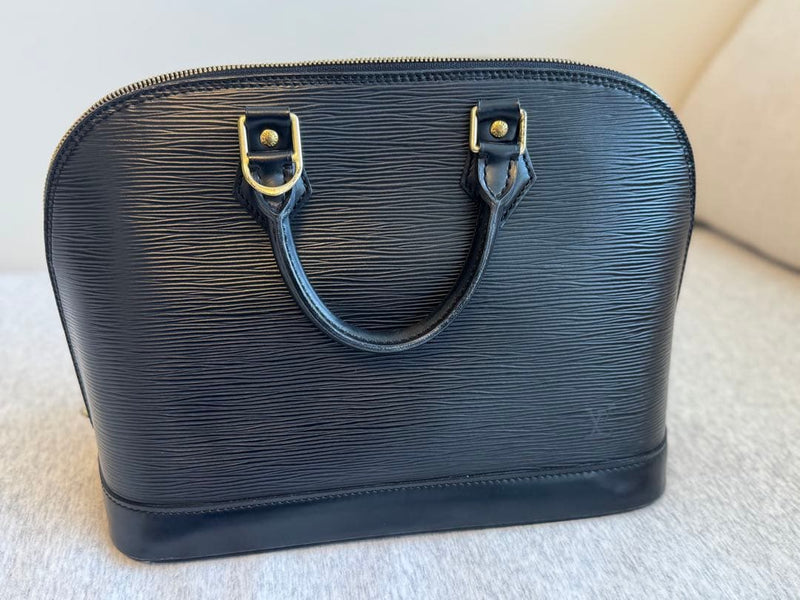 Epi Alma Pm Handbag Black Leather Gold Hardware