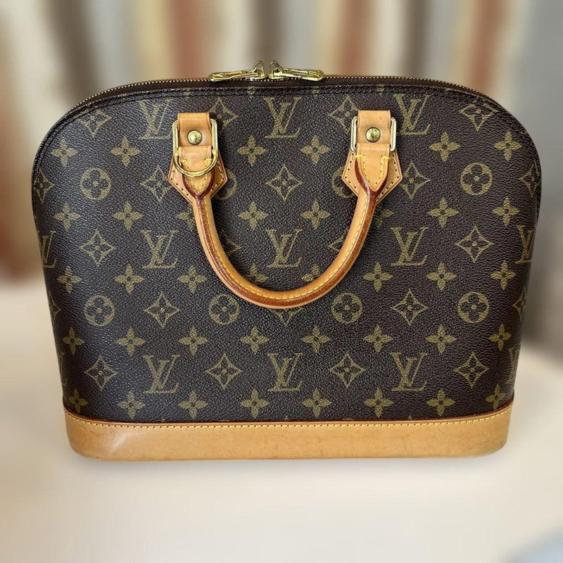 Alma Monogram Handbag Brown Coated Canvas Gold Hardware