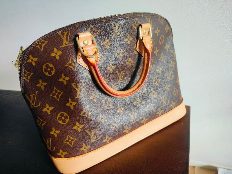 Louis Vuitton Alma Pm Monogram Handbag Leather Padlock Key