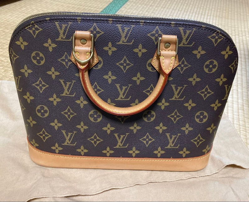 Louis Vuitton Monogram Alma Handbag Canvas Leather Navy Gold Key