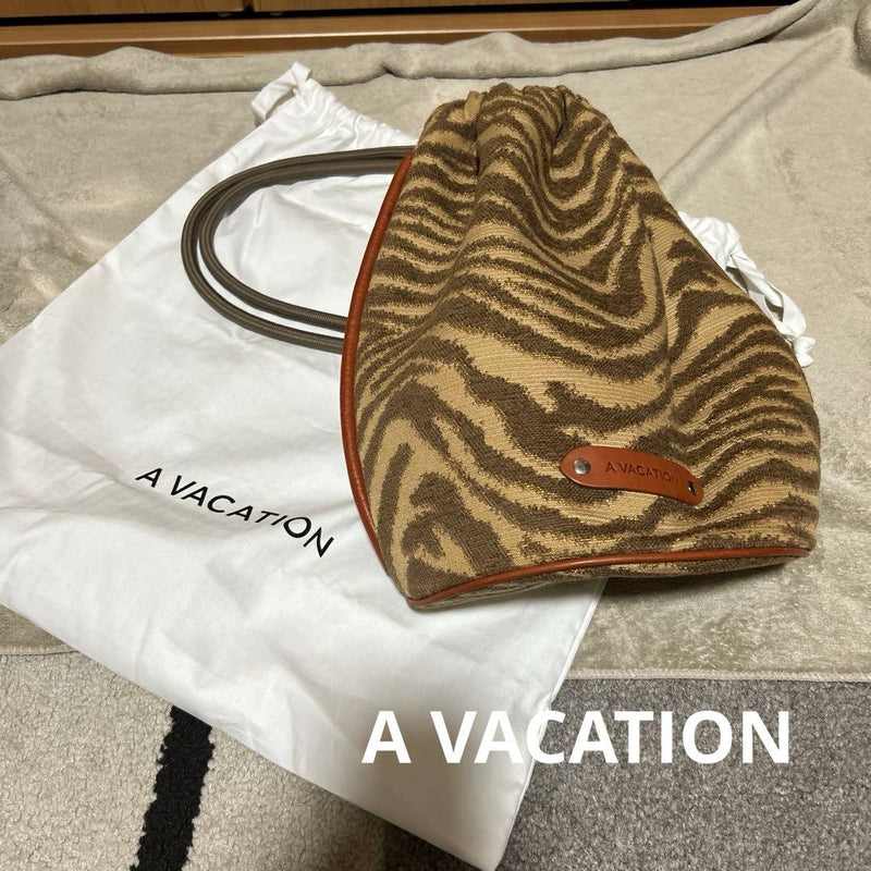 A VACATION Brown Zebra Pool Drawstring Shoulder Bag Leather Piping H35cm D23cm