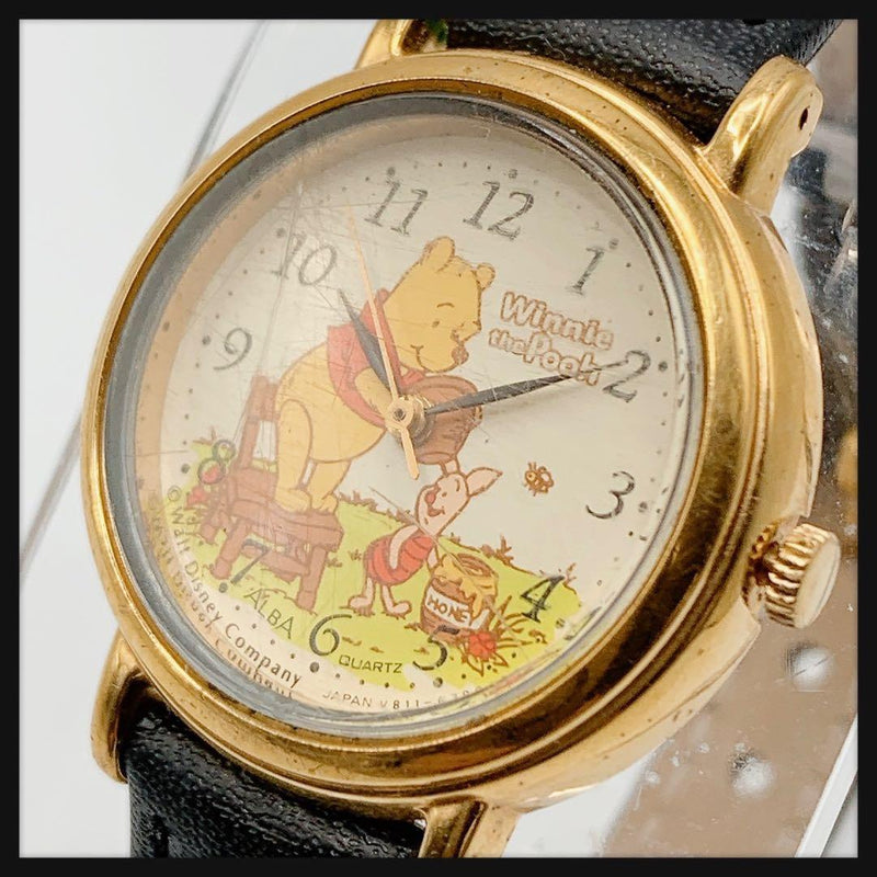 Winnie the Pooh V811-1740 Ladies Quartz Stainless Steel Gold Black Dial