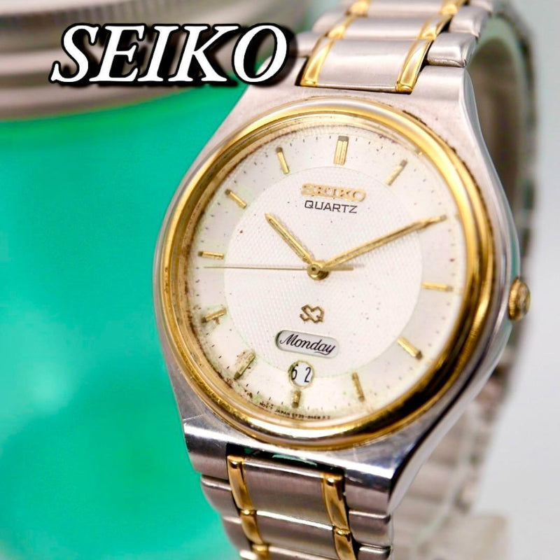 Date 972 Mens Watch Silver Round Dial Gold Accents Classic Dress Watch