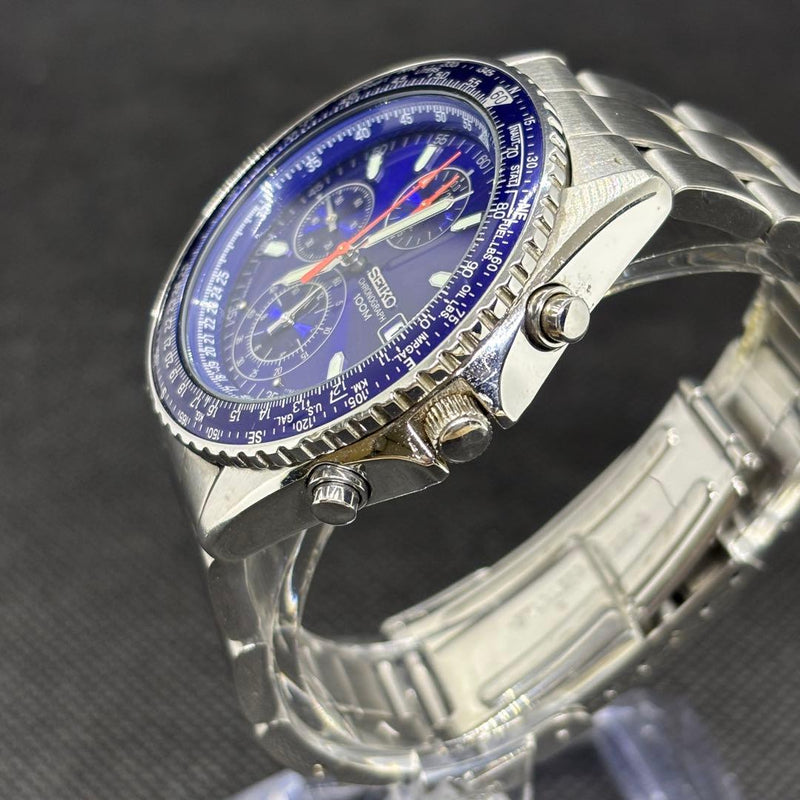 Seiko 7T92-0CF0 Quartz Chronograph Blue Dial Slide Rule Bezel SS Bracelet 10BAR