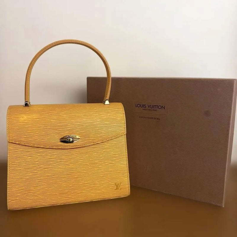 LOUIS VUITTON Yellow Epi Leather Handbag Material Epi Leather Color Yellow LV