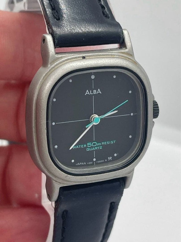 ALBA Ladies Quartz Square Tank Watch Black Dial Black Band Gold Tone 50m