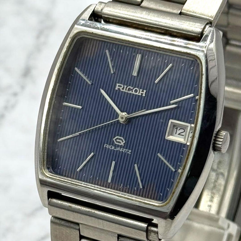 Ricoh Riquartz 596115 Quartz Watch Blue Striped Dial Date Tonneau Stainless