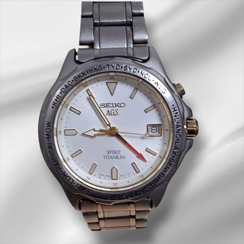 SEIKO Spirit Titanium 5M45-6A20 AGS Kinetic 37mm Ivory Dial GMT Date Mens Watch