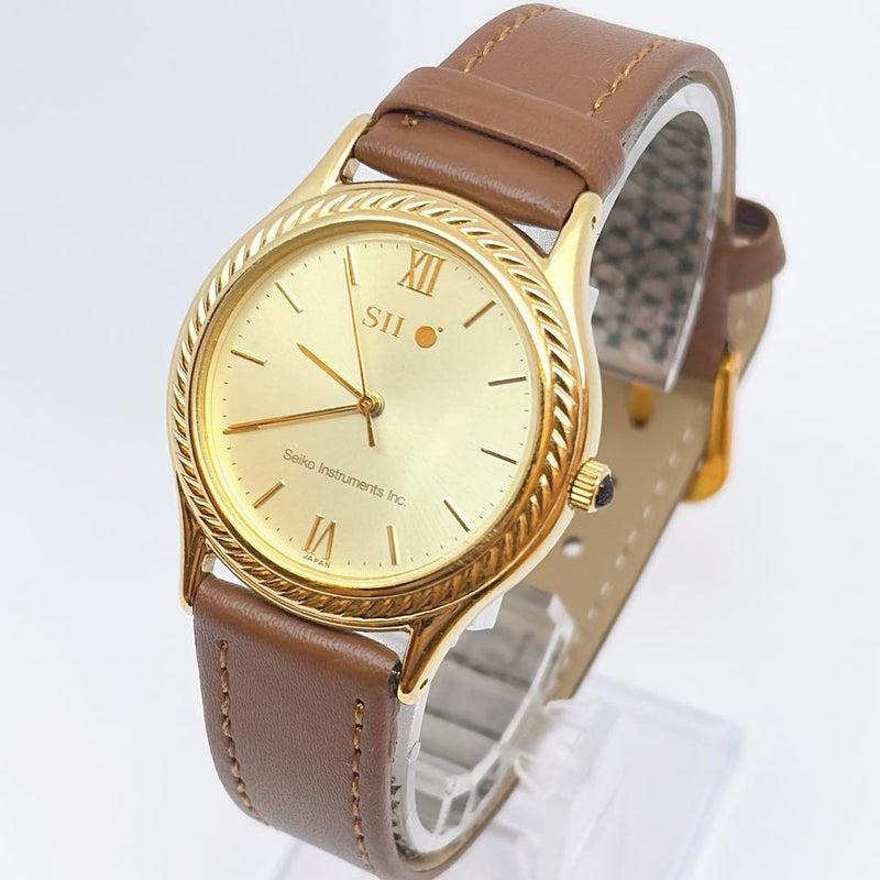 SII Seiko Instruments Mens Quartz Gold Roman Dial Base Metal Bezel 30.7mm Watch