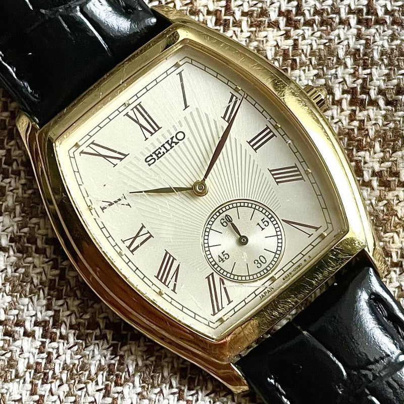 Seiko 6G28-00A0 Quartz Tonneau SS Gold 33-34mm Roman Small Sec Watch Mineral
