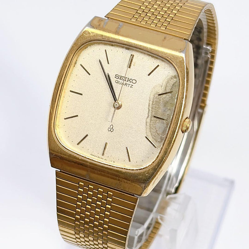 Seiko Quartz Cal.6030 Rectangular Gold Plated SS Back Bracelet Black Dial Watch