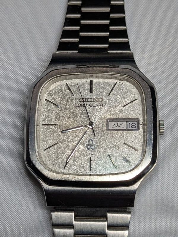 SEIKO LORD QUARTZ Watch 7143-5000 Quartz Day-Date Kanji Square Cream Textured