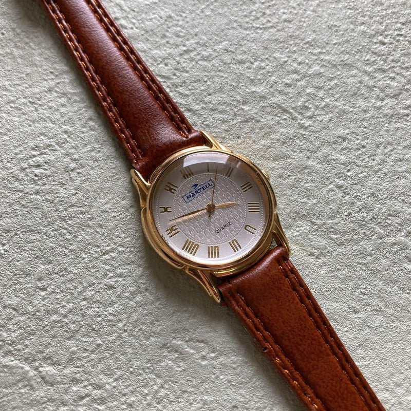 Martell Quartz Gold Tone Ivory Guilloche Roman Dial Brown Leather Watch