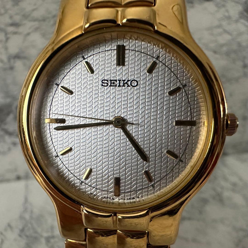 SEIKO V701-A090 Quartz Watch 31mm Stainless Steel Silver Dial Gold Tone
