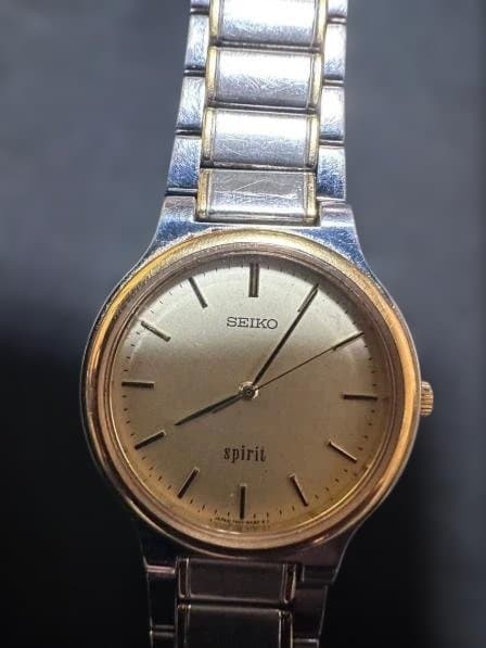 SEIKO spirit Quartz Movement Analog Silver Gold Two Tone Oval Dial Wristwatch
