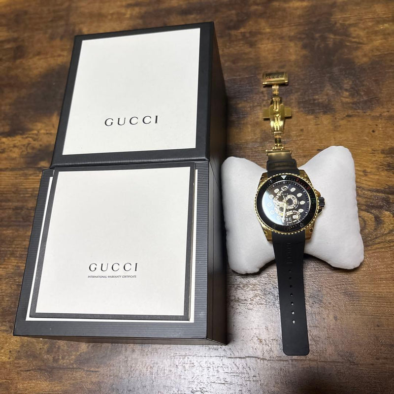Gucci Dive YA136219 45mm Gold Tone Quartz Black Snake Dial Black Rubber Watch
