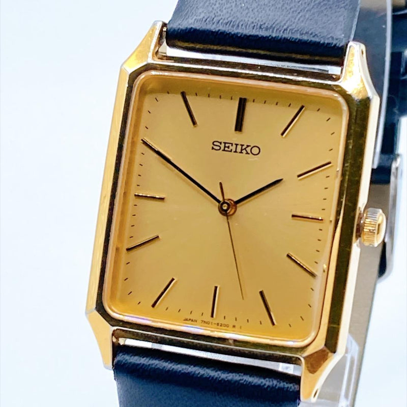 SEIKO Mens Quartz Watch 7N01-5180 Gold Tone Tank 25.1mm Black Band Bar Index 542
