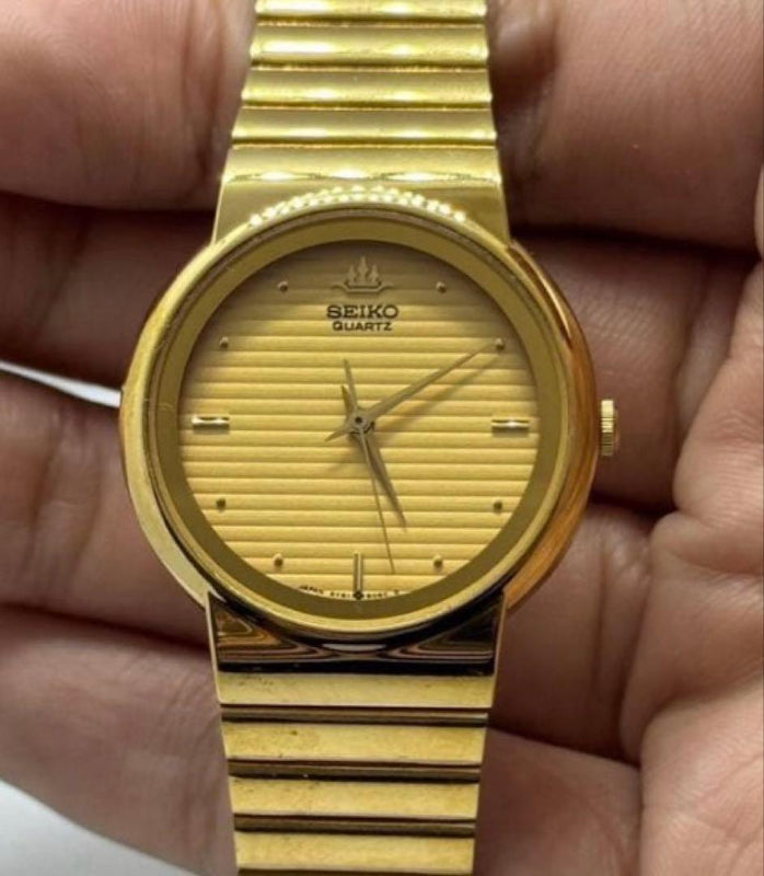 SEIKO QUARTZ Galaxy Gold-tone Horizontal Oval Case Horizontal Striped Dial