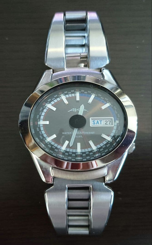 Seiko Alba AKA V743-5A10 Quartz Watch Stainless Steel Orange Dial 10BAR Day-Date