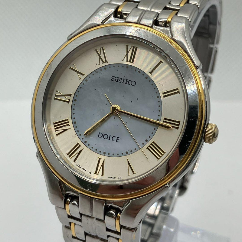 Seiko Dolce V181-0AC0 Mens Solar Quartz Watch 30mm Silver Dial Gold Steel Combi