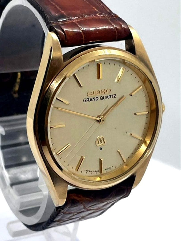 SEIKO GRAND QUARTZ Quartz Watch Gold Case Champagne Dial Brown Leather Band