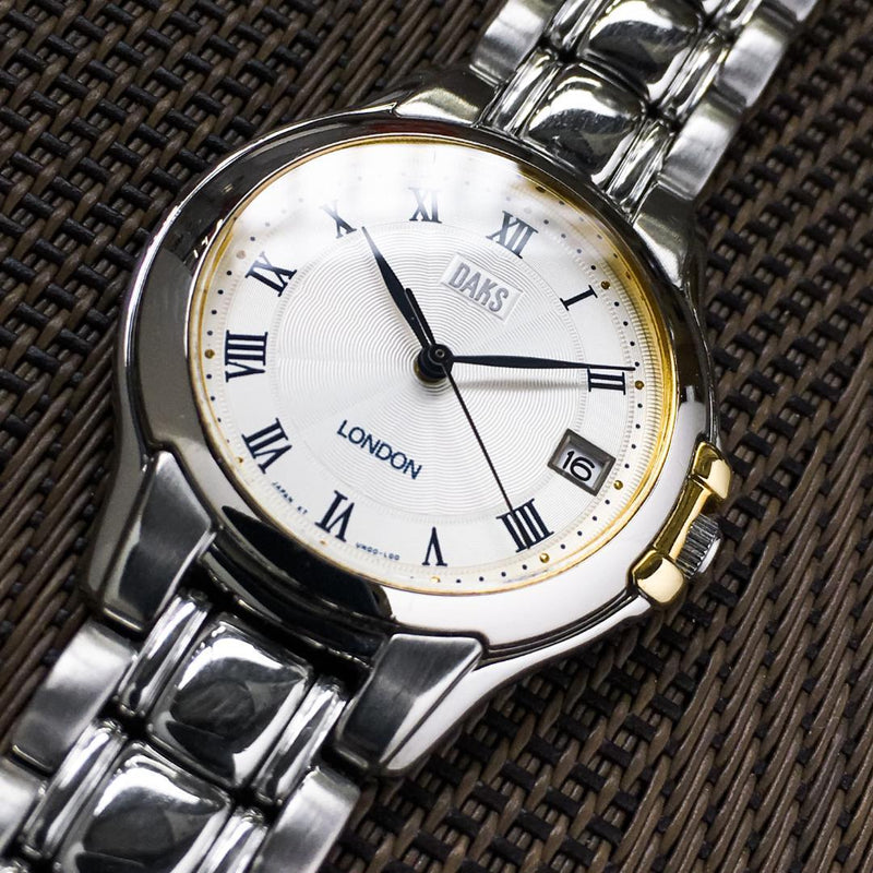 DAKS Quartz Watch Stainless Steel 34mm Silver Guilloche Dial Date Sapphire