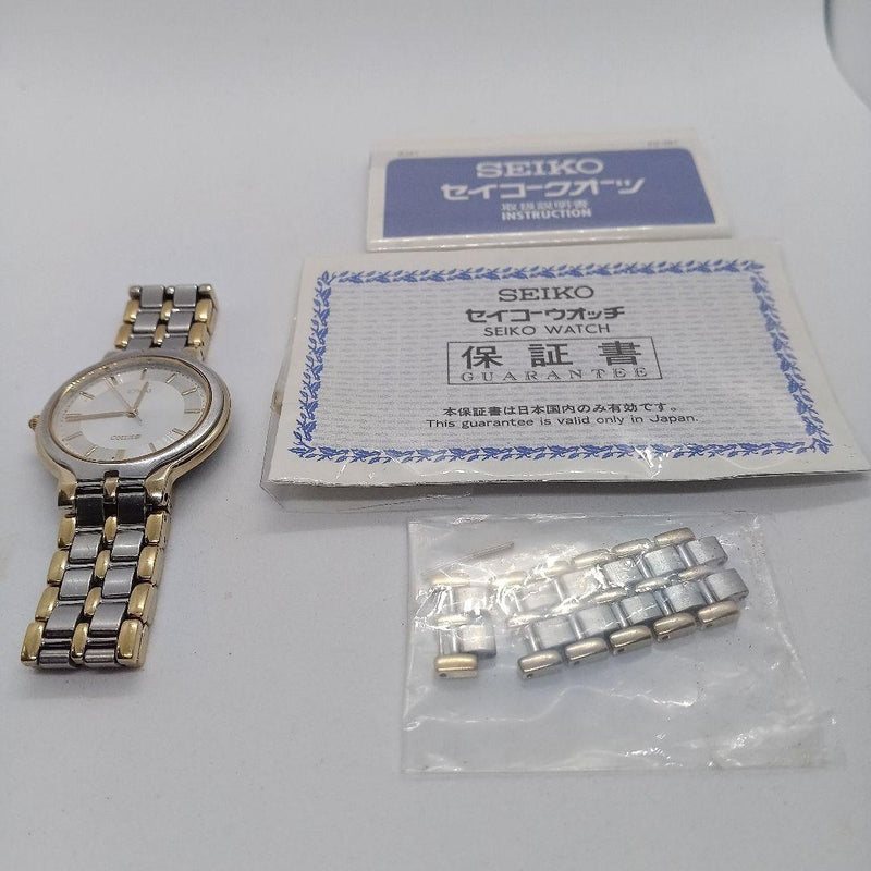SEIKO DOLCE Men Analog Quartz Watch Silver Tone Gold Tone Case Bracelet