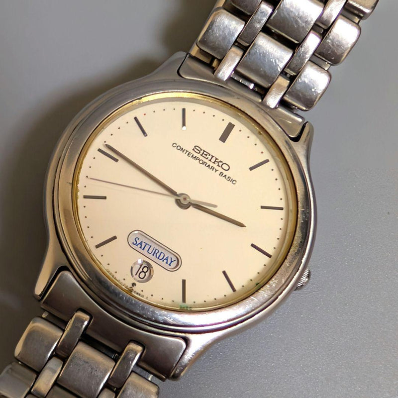 Seiko 5H23-6B90 1990 Contemporary Basic Mens Quartz SS 30mm Day Date WR Watch