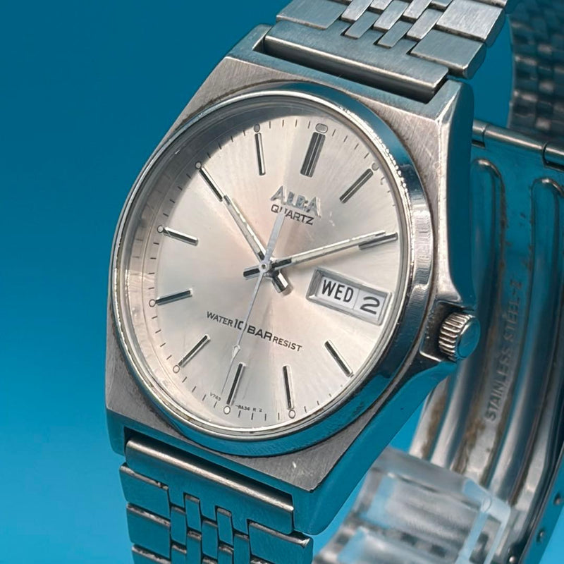 SEIKO ALBA V743-8A10 Quartz 35mm SS Silver Dial Day-Date 10 ATM WR Mens Watch