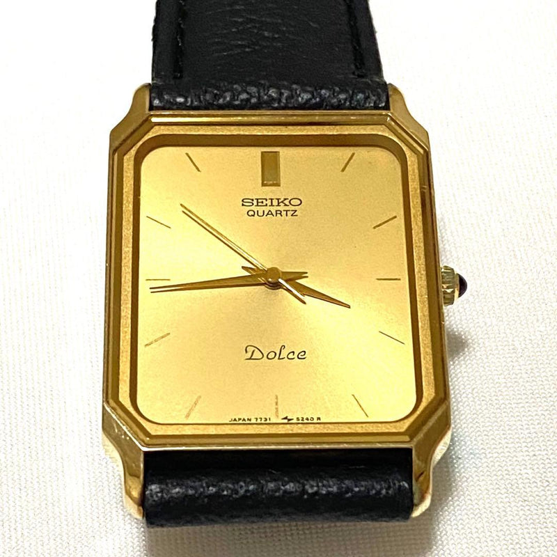 Seiko Dolce 7731-5210 Quartz 24x27mm Gold Dial Square Case Black Leather Watch