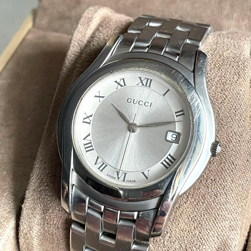 Gucci 5500M Mens Watch Quartz Black Dial Roman Index Stainless Steel Silver Date