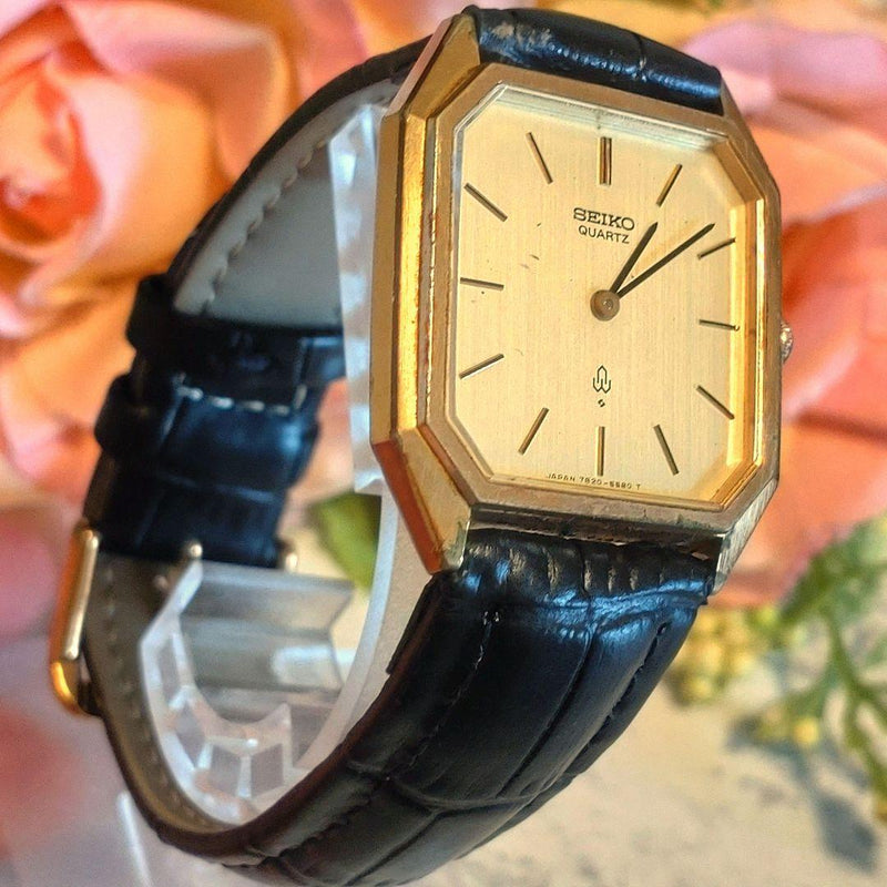 SEIKO QUARTZ Chariot Mens Gold Octagon Case Square Dial Champagne Black Leather