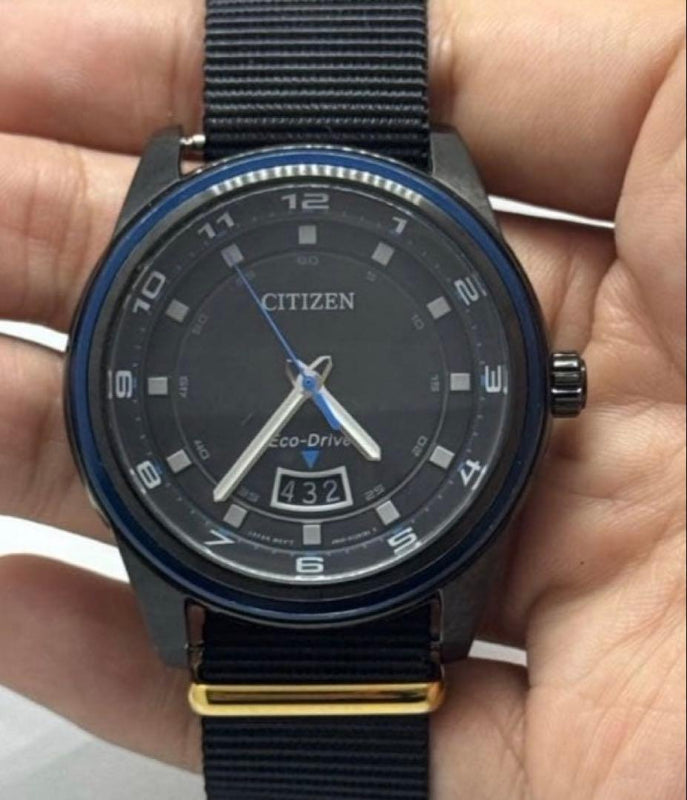 CITIZEN A1 Eco-Drive Mens Analog Black Case Black Nylon Gold Tone Wristwatch