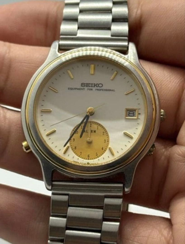 Seiko 7T32-6E89 Quartz Analog Two-Tone Stainless Steel Alarm Date Mens Watch