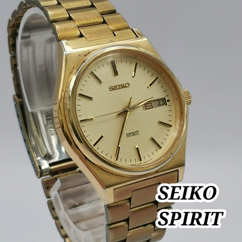 SEIKO SPIRIT 7N48-7000 Quartz Day-Date Gold Dial Gold Tone SS 31.7mm Watch