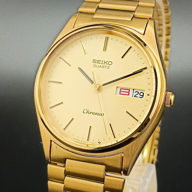 SEIKO Chronos 8123-7080 Quartz Watch Gold Tone Stainless Steel 33mm Day-Date